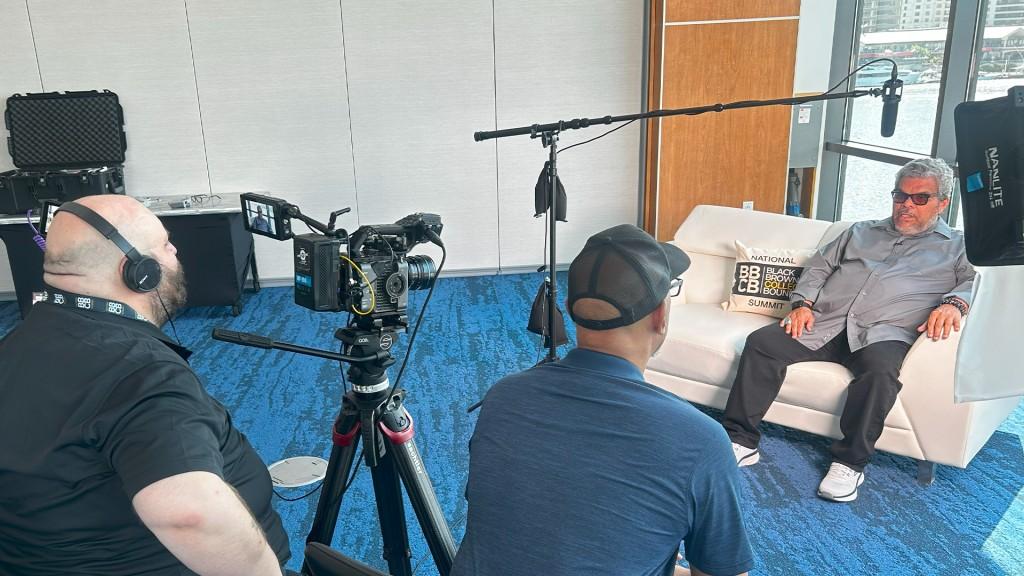 Interview scene with three people