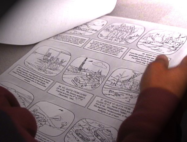 Child reading illustrated comic pages