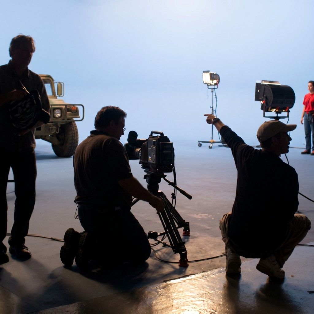 Film crew in studio setting